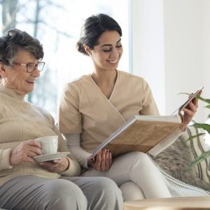 LARGE-bigstock-Caretaker-With-Elder-In-Room-245676247-1024x683